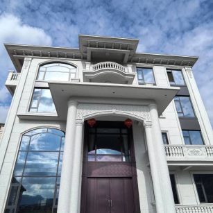 包头白麻别墅外墙干挂石材效果示例