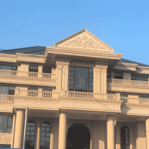 包头黄金麻别墅外墙干挂石材效果示例