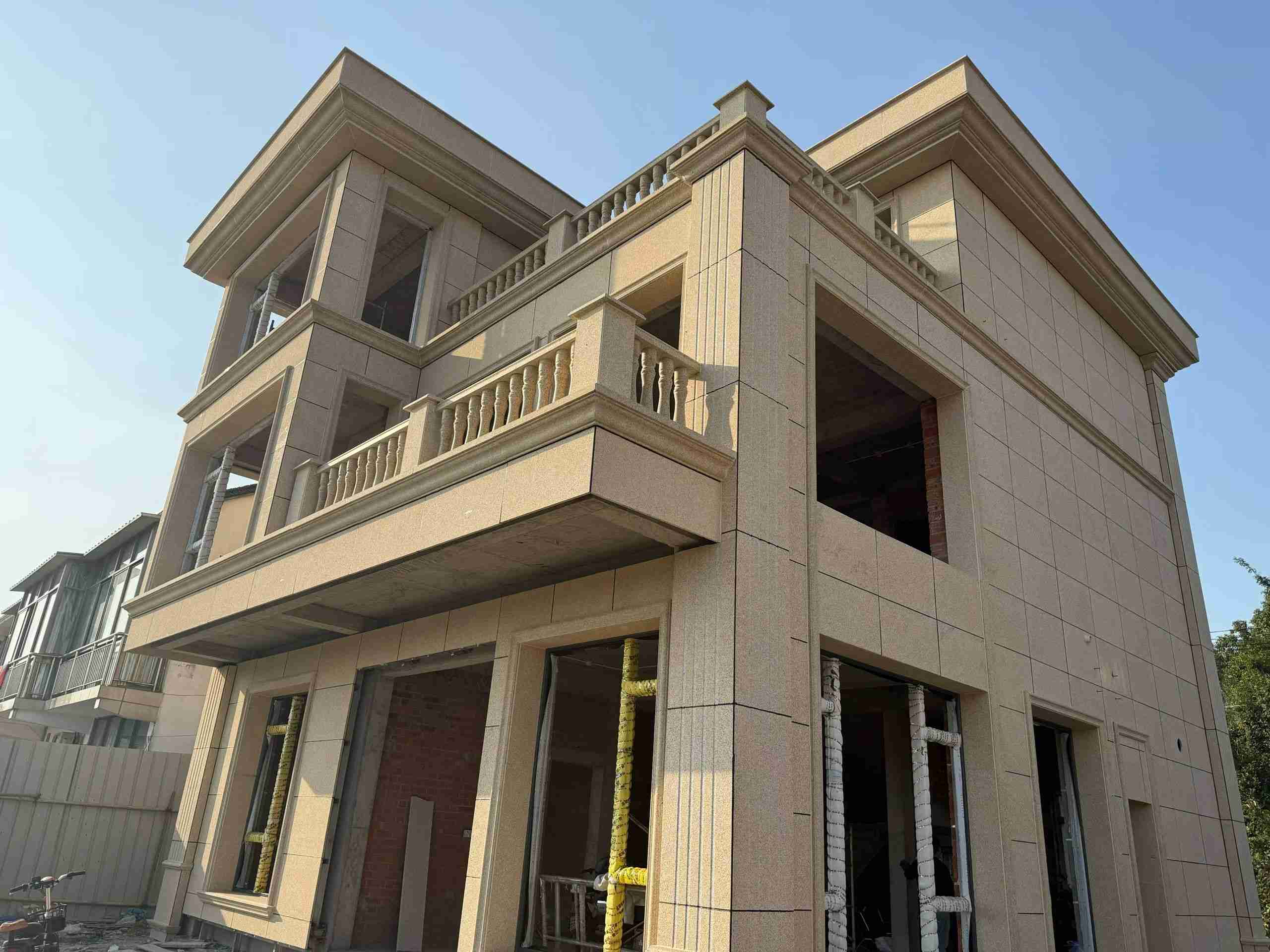 包头 黄金麻花岗岩石材荔枝面外墙干挂效果展示