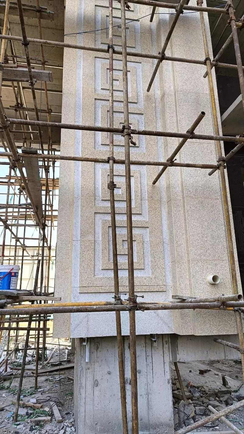 包头 黄金麻花岗岩别墅外墙干挂回纹造型效果